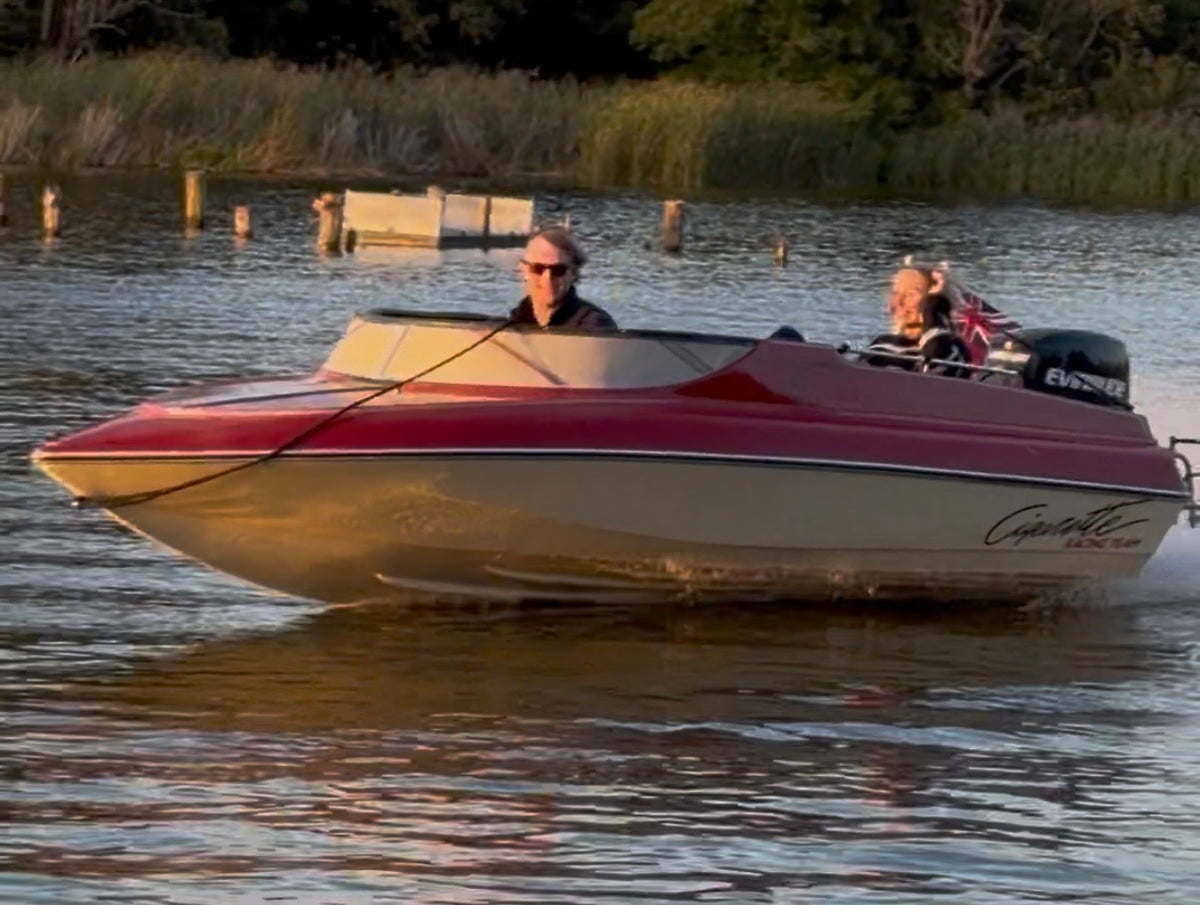 red speedboat on the Norfolk broads 