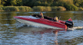 speedboat on the Norfolk broads being driven by powerboat racer Tom Thwaites 